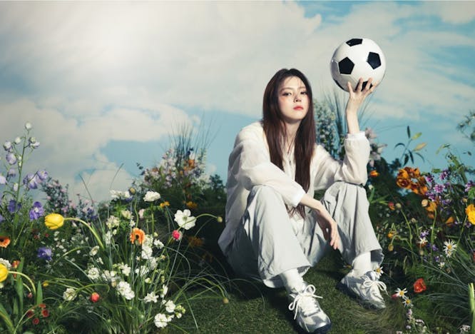 soccer ball person sitting female girl teen sphere daisy flower shoe
