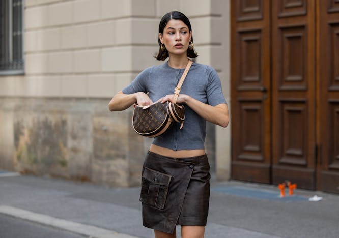 berlin skirt bag handbag shorts sleeve adult female person woman purse