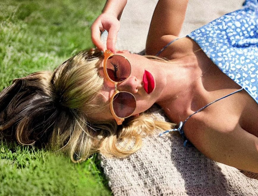 accessories sunglasses grass plant person sunbathing