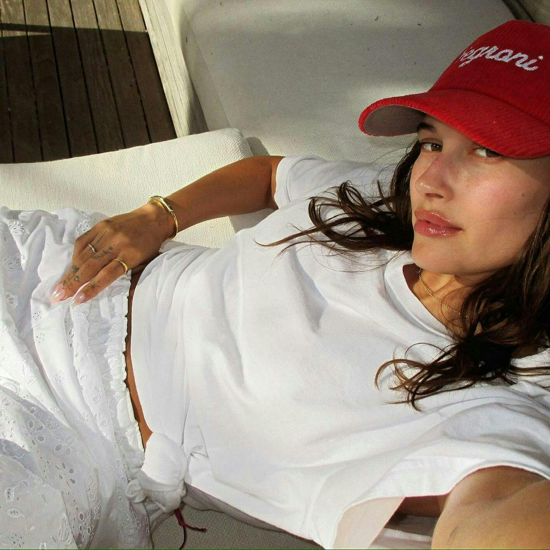 baseball cap cap hat person photography portrait blouse couch accessories bracelet